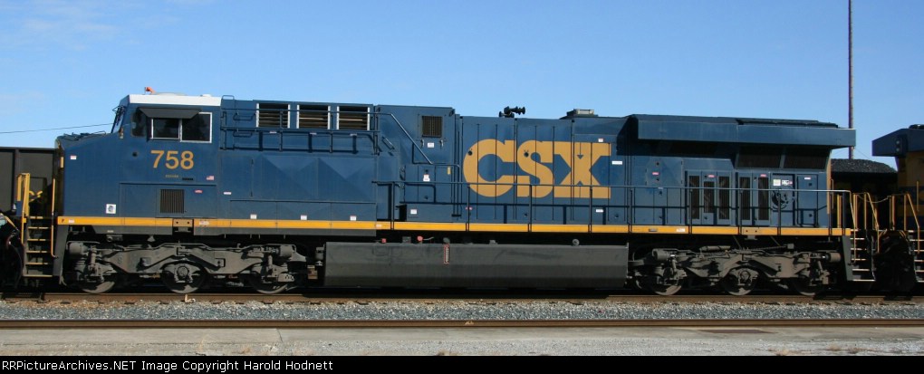 CSX 758 sits with other GE's in the yard